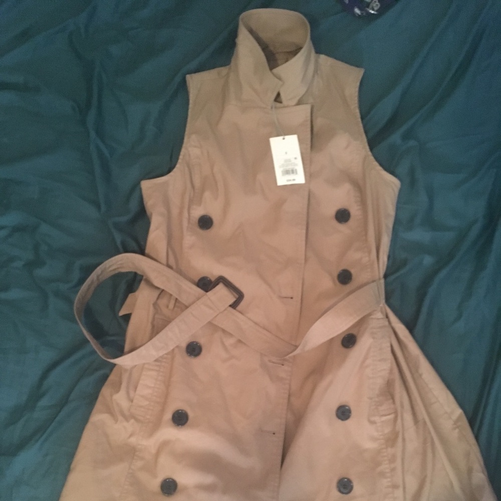 Tan sleeveless trench coat